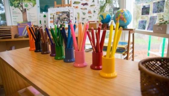 Image of colouring in pencils on a table at an early childhood setting
