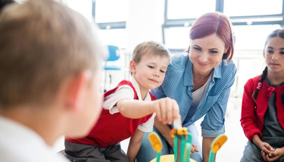 Children interacting with an activity in a childcare center