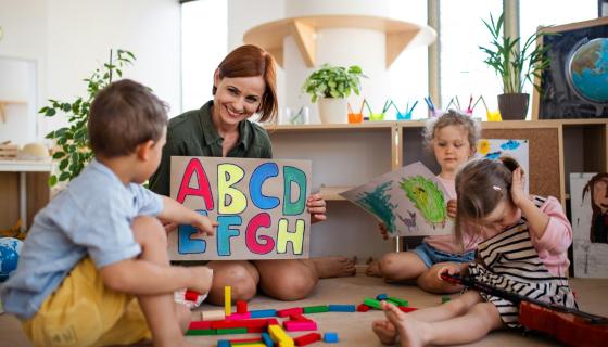 Children learning letters in a child care center