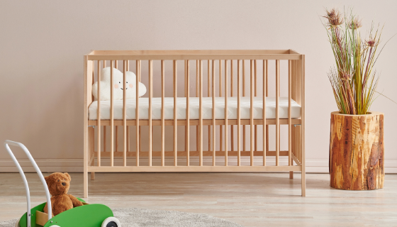 An image showing a timber cot.